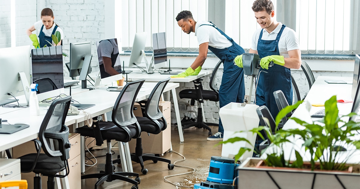 Cleaning team cleaning an office